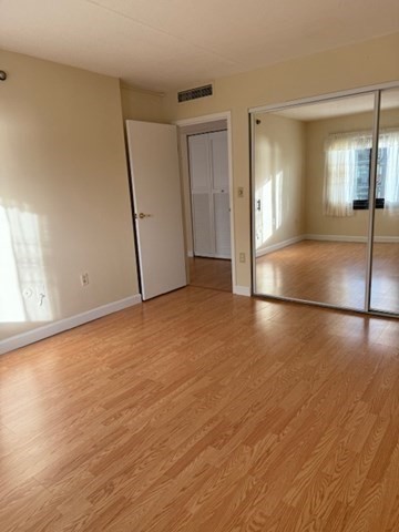 73 Broad Reach, Unit M36C Weymouth, MA 02191 - Photo 18 of 31 a view of a livingroom with wooden floor