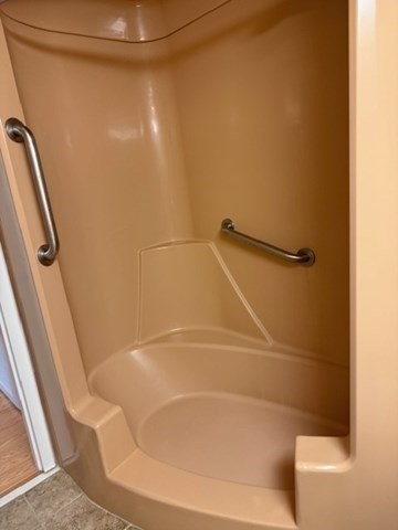 73 Broad Reach, Unit M36C Weymouth, MA 02191 - Photo 22 of 31 a bathroom with a shower and a bath tub