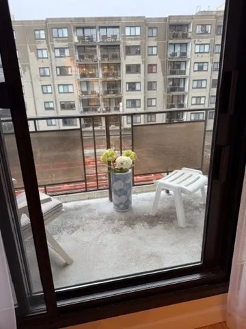 a bathroom with a toilet a sink and a mirror