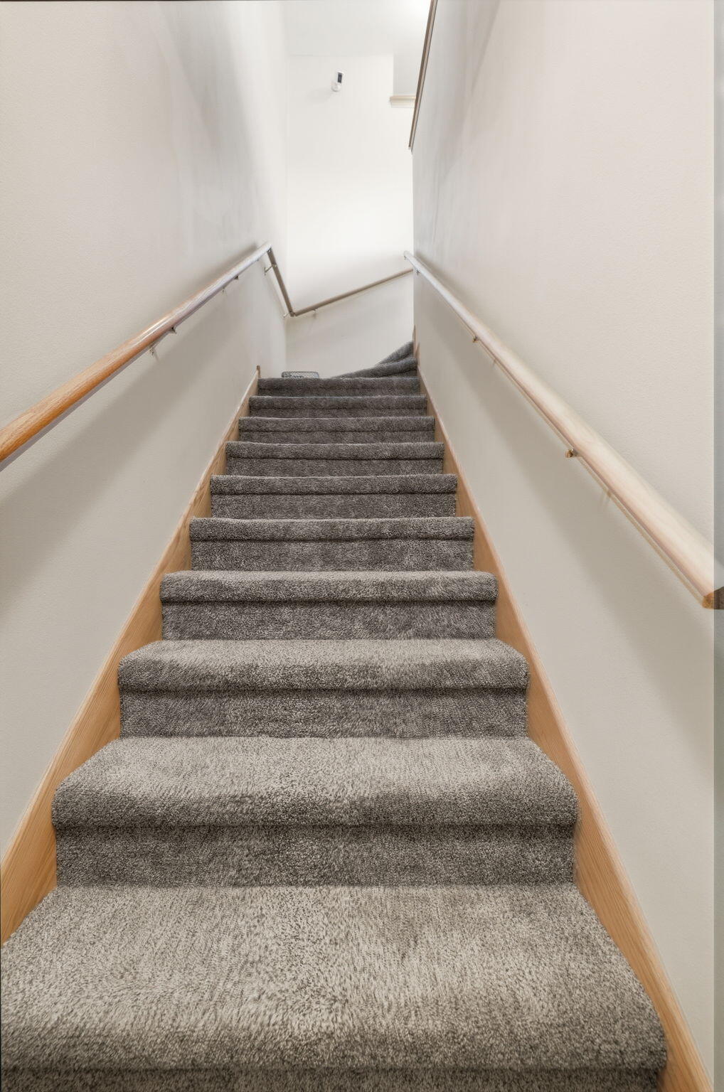 838 Boulder Trail, Unit 205 Mount Pleasant, WI 53406 - Photo 21 of 25 Entry Staircase