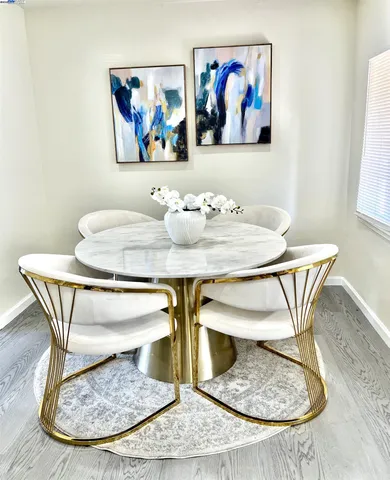 a view of a dining room with furniture