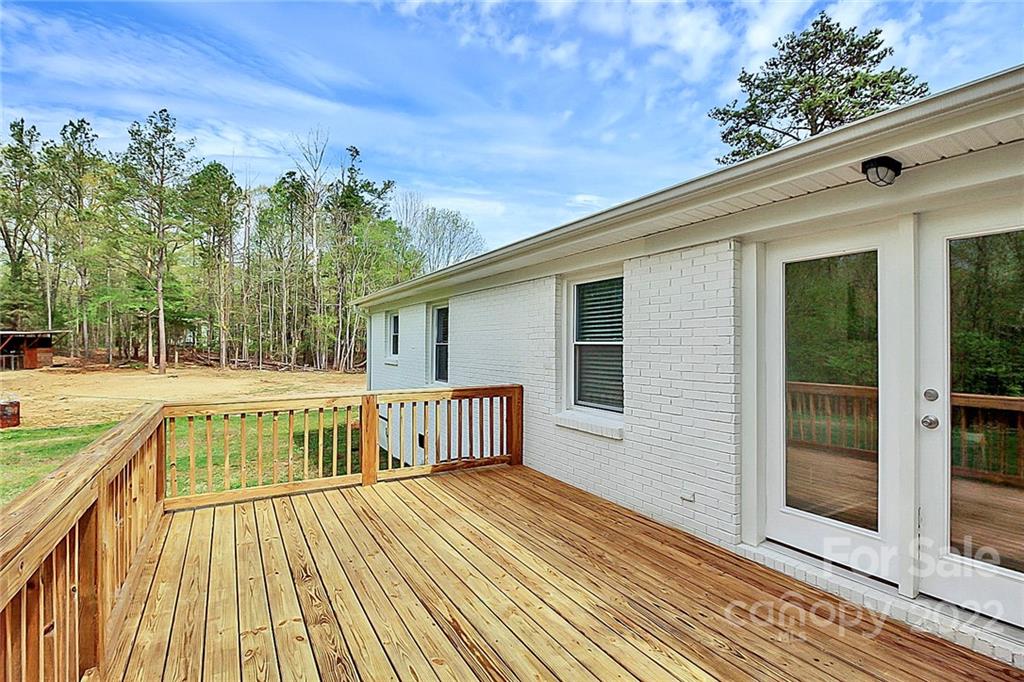 2429 Morris Road Lancaster, SC 29720 - Photo 37 of 38 a view of a house with a wooden deck
