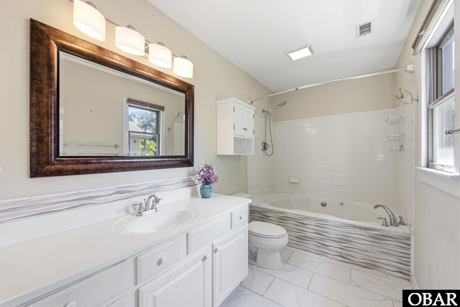 1710 Sea Swept Road Kill Devil Hills, NC 27948 - Photo 25 of 53 Ensuite bathroom