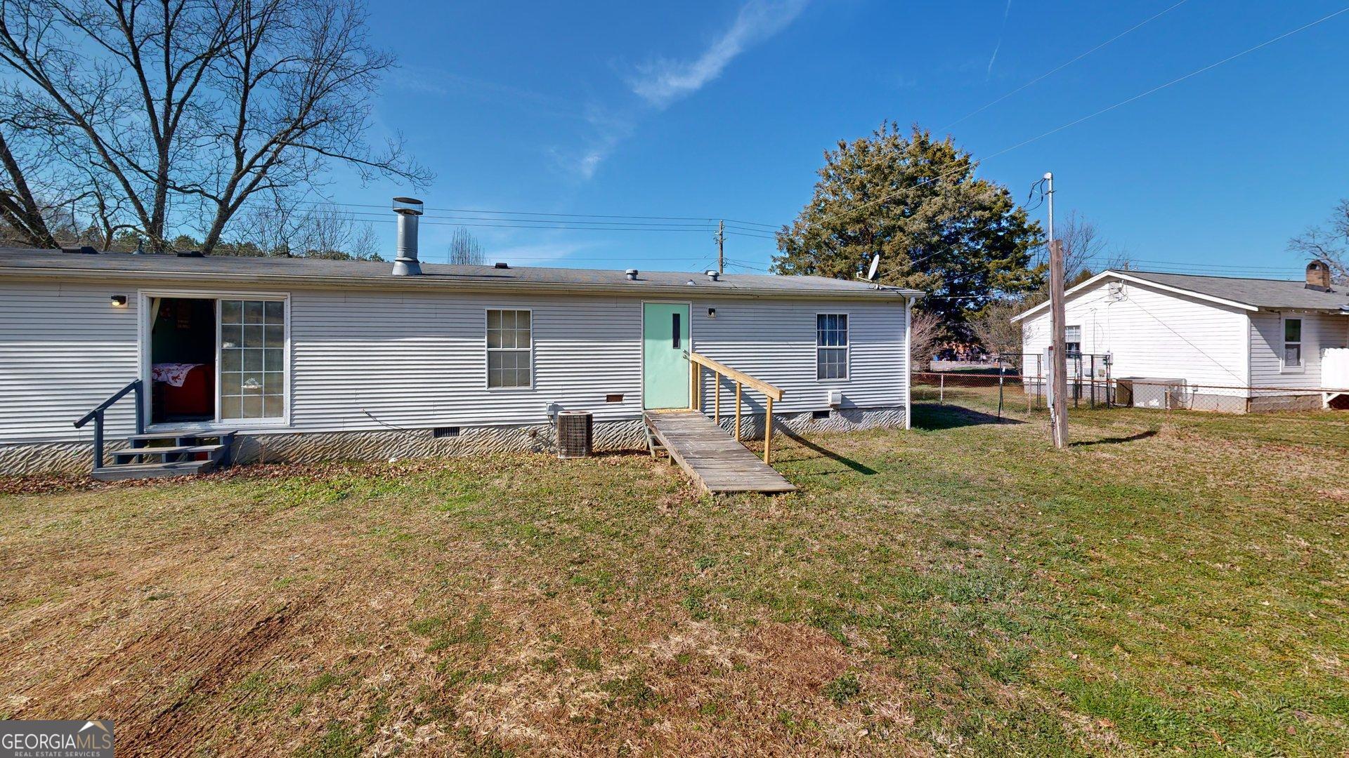 189 Boyd Valley Road Southeast Rome, GA 30161 - Photo 14 of 32 front view of a house with a yard