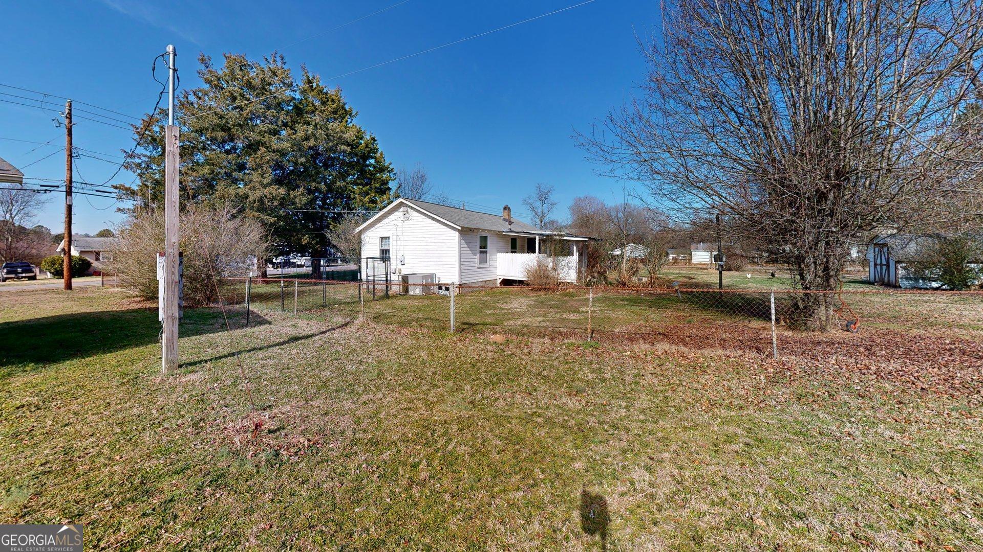 189 Boyd Valley Road Southeast Rome, GA 30161 - Photo 15 of 32 a view of a yard with a house in the background