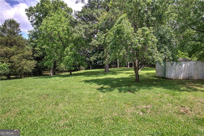 189 Boyd Valley Road Southeast Rome, GA 30161 - Photo 20 of 32 a view of a tree in a yard