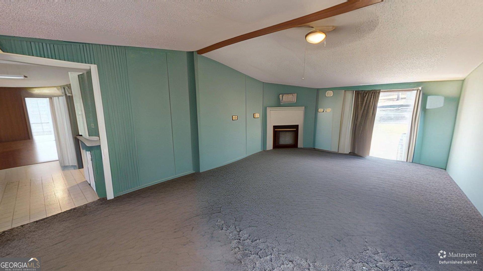 189 Boyd Valley Road Southeast Rome, GA 30161 - Photo 23 of 32 a view of a livingroom with a staircase