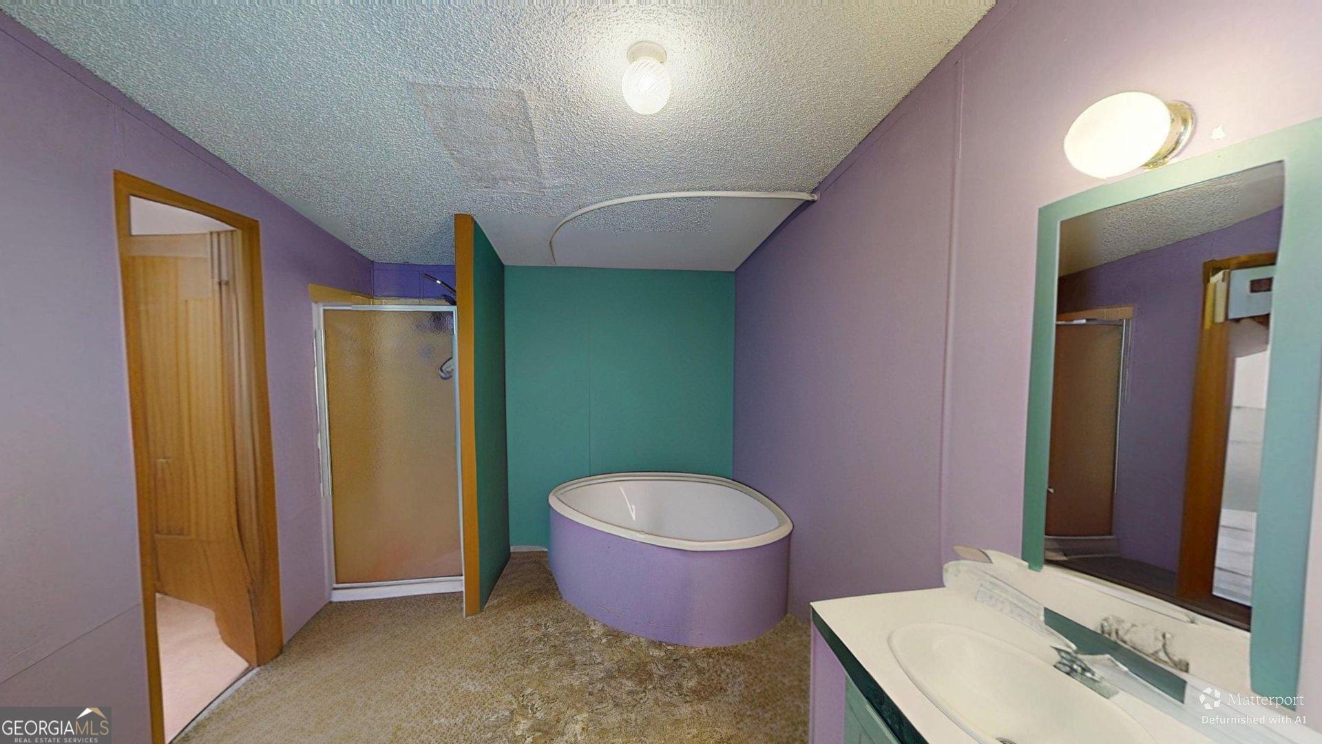 189 Boyd Valley Road Southeast Rome, GA 30161 - Photo 26 of 32 a bathroom with a toilet sink and mirror