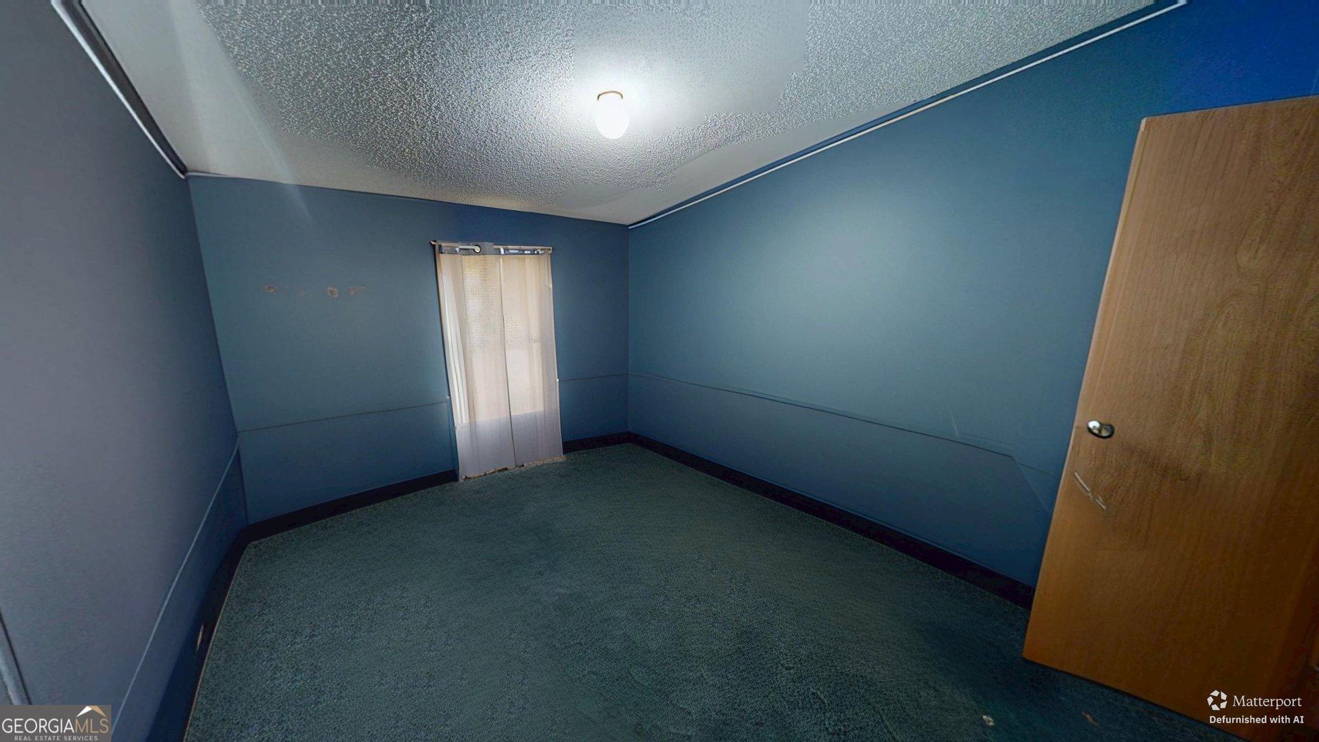 189 Boyd Valley Road Southeast Rome, GA 30161 - Photo 30 of 32 an empty room with windows