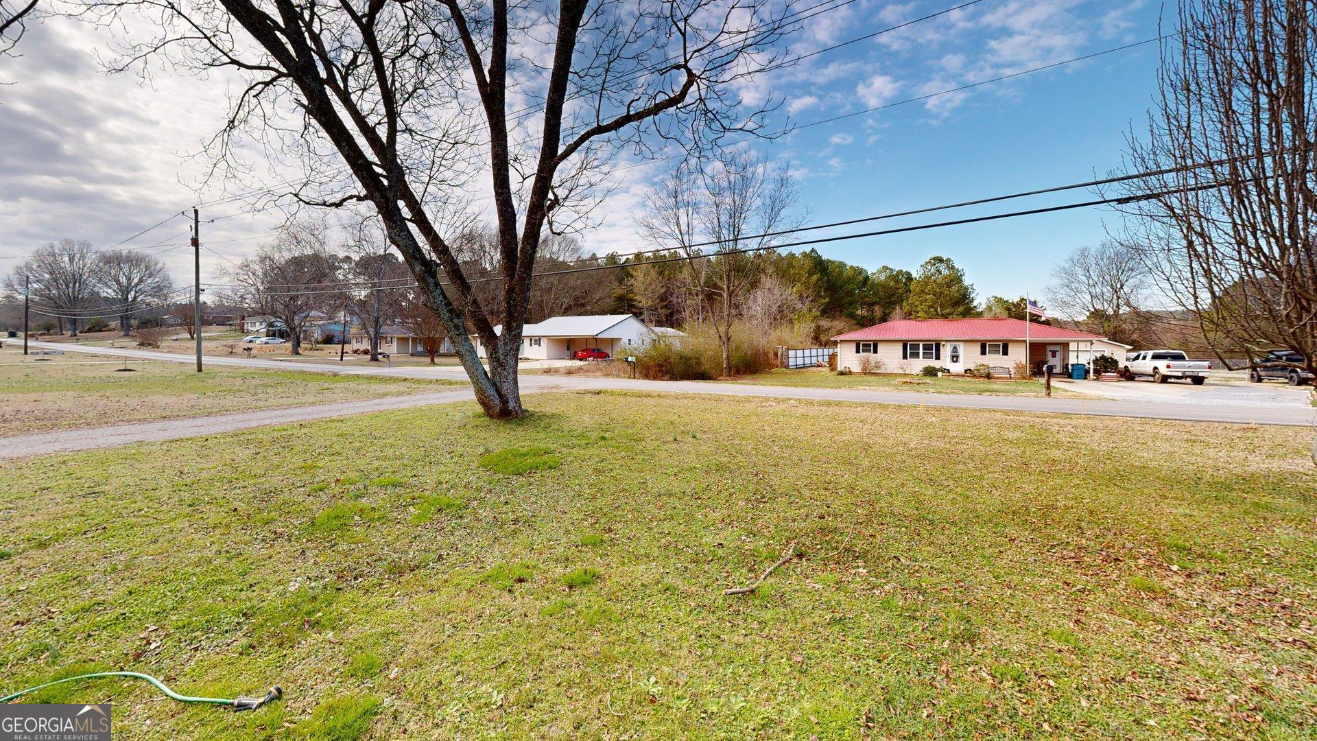 189 Boyd Valley Road Southeast Rome, GA 30161 - Photo 10 of 32 a view of yard with swimming pool and green space