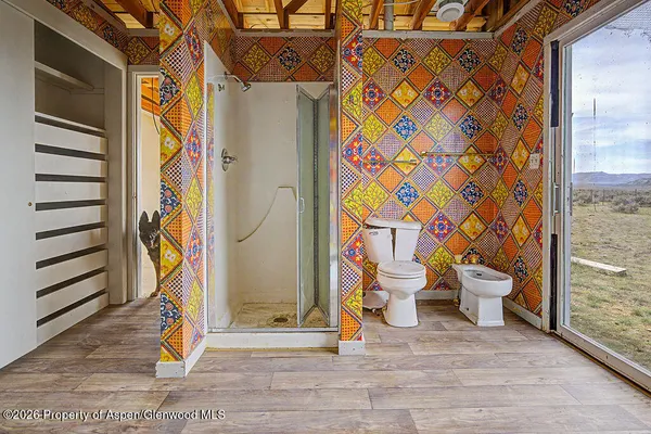 a view of backyard and porch