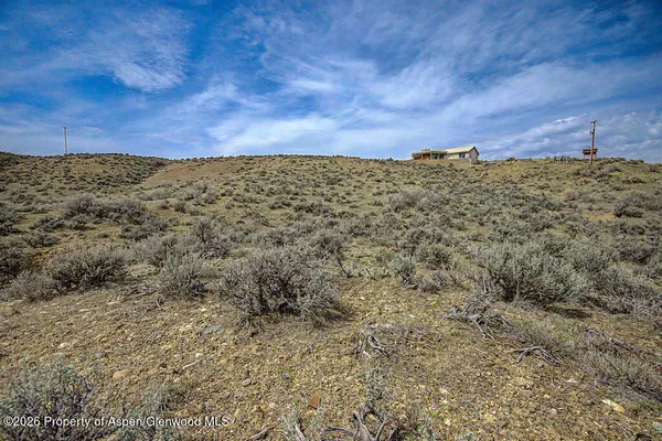 a view of ocean with a city