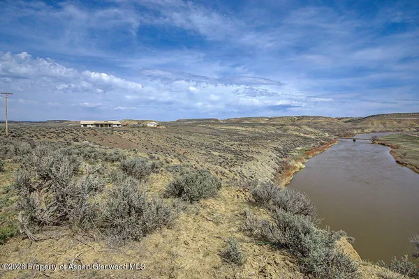 a view of a terrace with a lake view