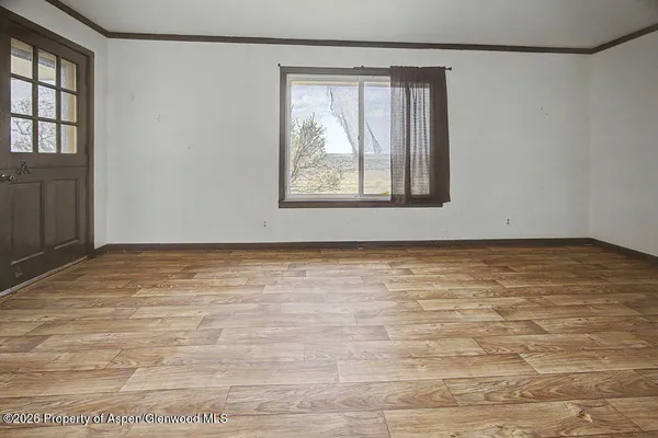 a view of a glass door with a balcony