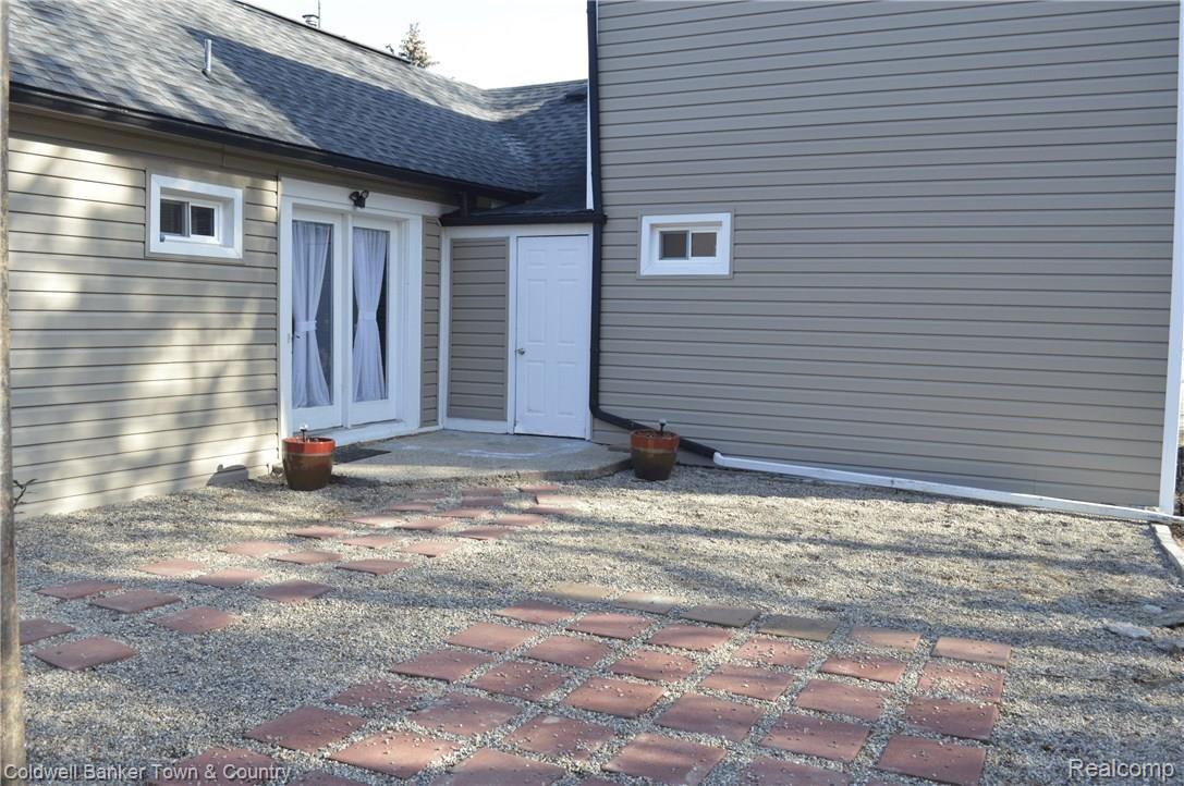 7575 North Fowlerville Road Fowlerville, MI 48836 - Photo 25 of 34 Perfect Patio for BBQ's