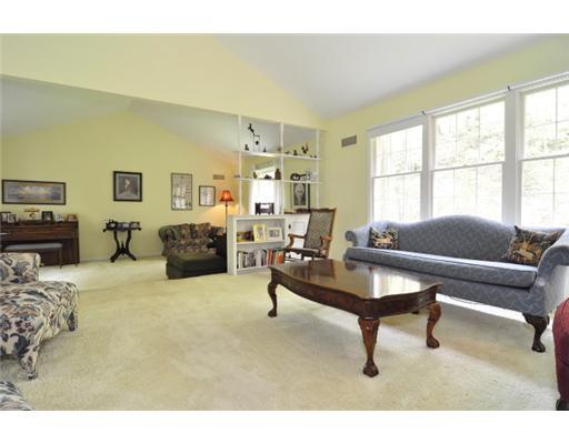 539 Old Mill Road Fox Chapel, PA 15238 - Photo 4 of 17 Den. The den flows from the living room and boasts soaring cathedral windows and many large windows for plenty of natural light. More space for entertaining or a quiet retreat.