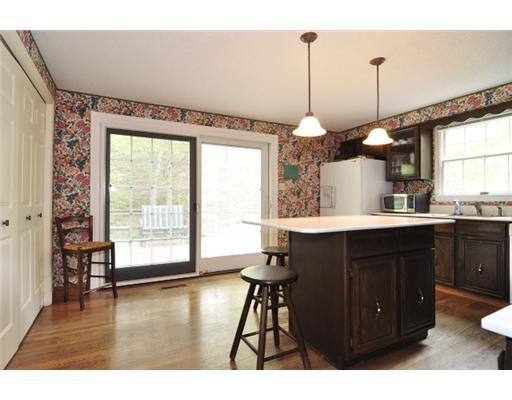 539 Old Mill Road Fox Chapel, PA 15238 - Photo 8 of 17 Kitchen. The large kitchen pantry is a dream space for storage. And the large window and oversized sliding door out to the deck bring in beautiful natural light.