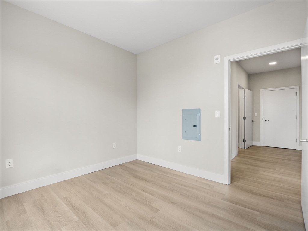 249 Corey Road, Unit 401 Boston, MA 02135 - Photo 13 of 34 wooden floor in a room