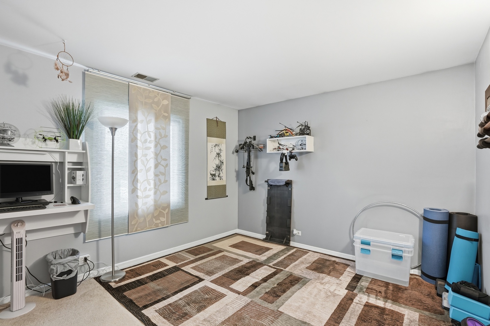 917 Patricia Lane, Unit 917 Crete, IL 60417 - Photo 11 of 17 a bedroom with a bed and a television