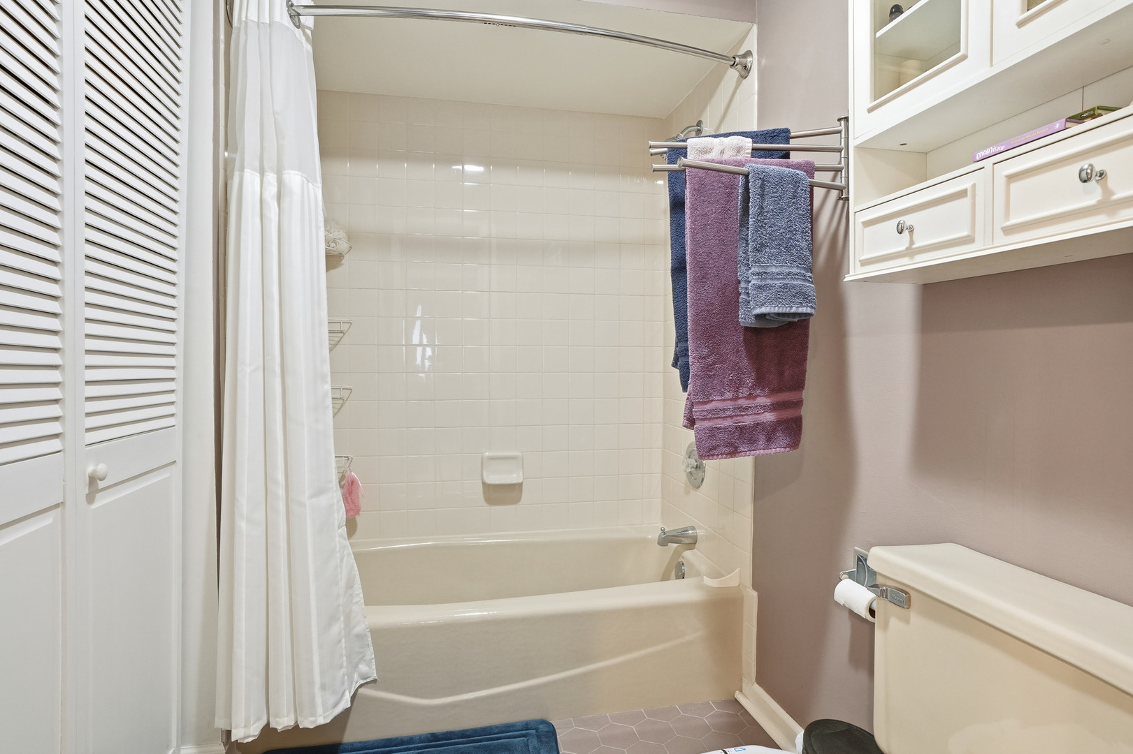 917 Patricia Lane, Unit 917 Crete, IL 60417 - Photo 14 of 17 a bathroom with a bathtub a toilet and a shower