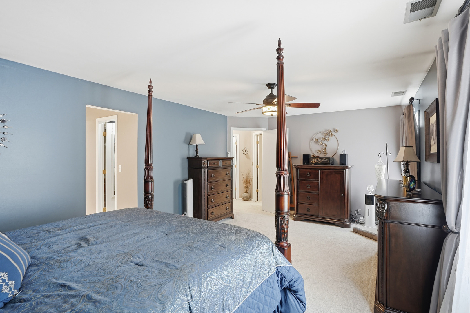 917 Patricia Lane, Unit 917 Crete, IL 60417 - Photo 9 of 17 a bedroom with a bed and a flat screen tv