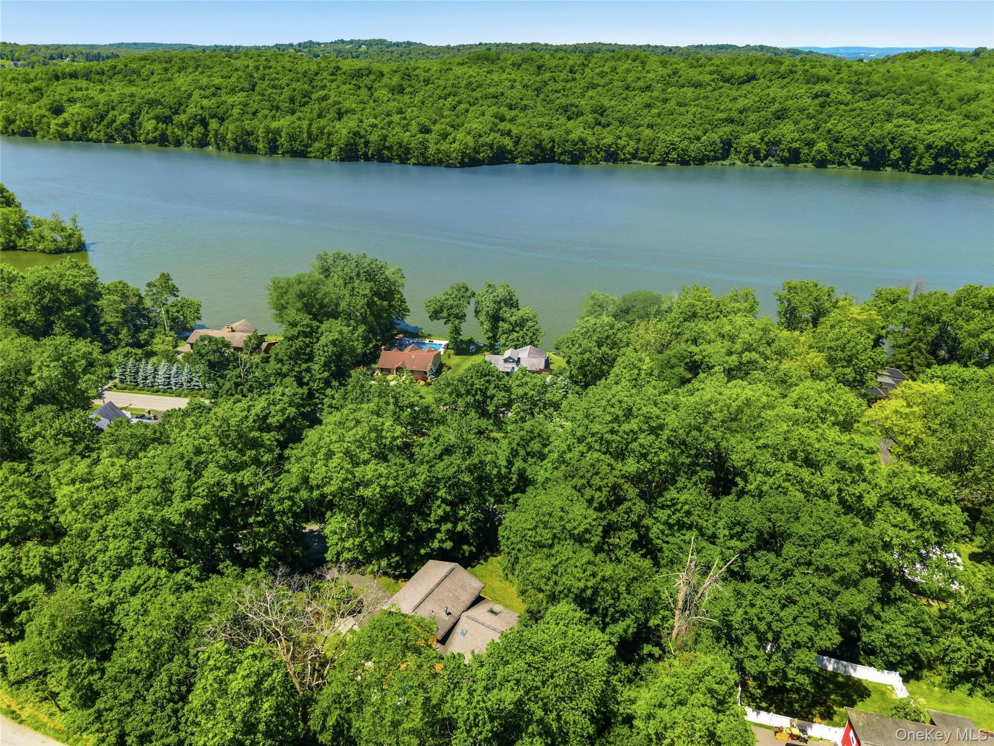 44 Sayer Road Blooming Grove, NY 10914 - Photo 39 of 39 an aerial view of a house with a yard and lake view