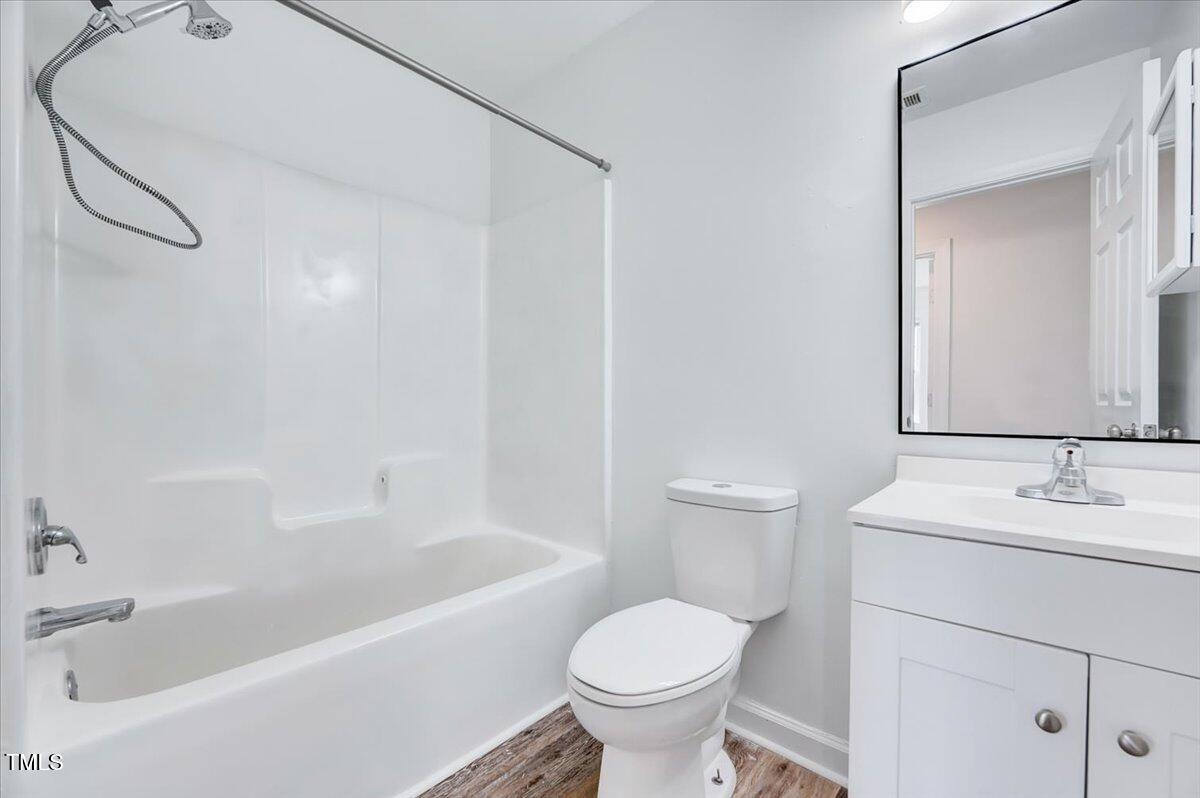 216 Katie Drive Rocky Mount, NC 27803 - Photo 18 of 27 a bathroom with a sink toilet and bathtub