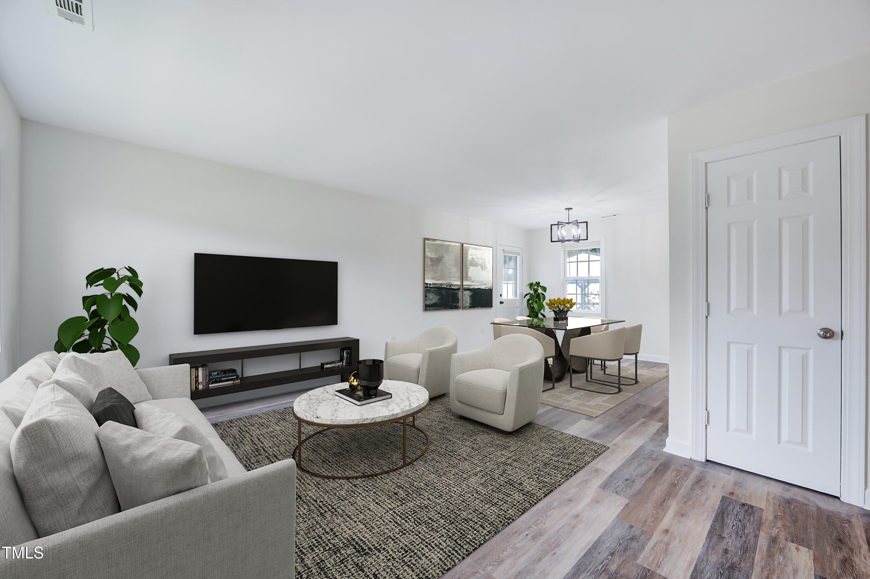 216 Katie Drive Rocky Mount, NC 27803 - Photo 4 of 27 a living room with furniture and a flat screen tv