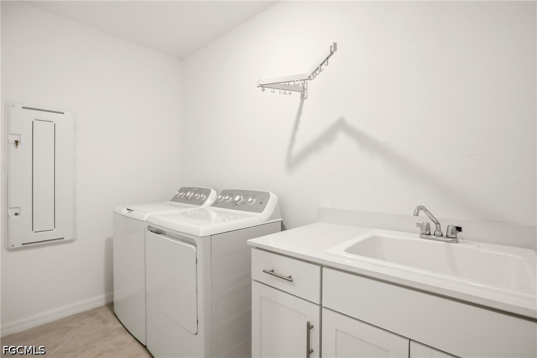 3751 Pebblebrook Ridge Court, Unit 101 Fort Myers, FL 33905 - Photo 36 of 48 a utility room with dryer and washer