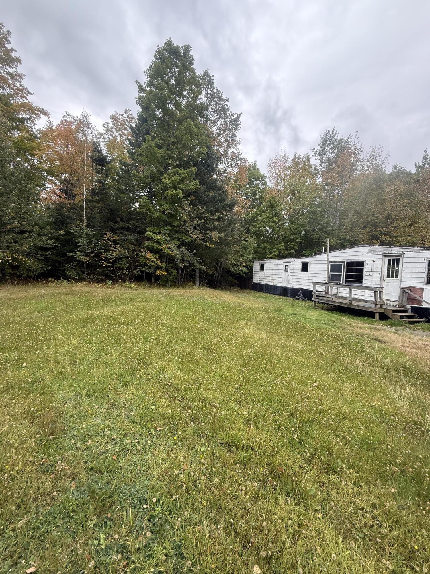 67 Valley Road Athens, ME 04912 - Photo 8 of 13 mobile and lawn front