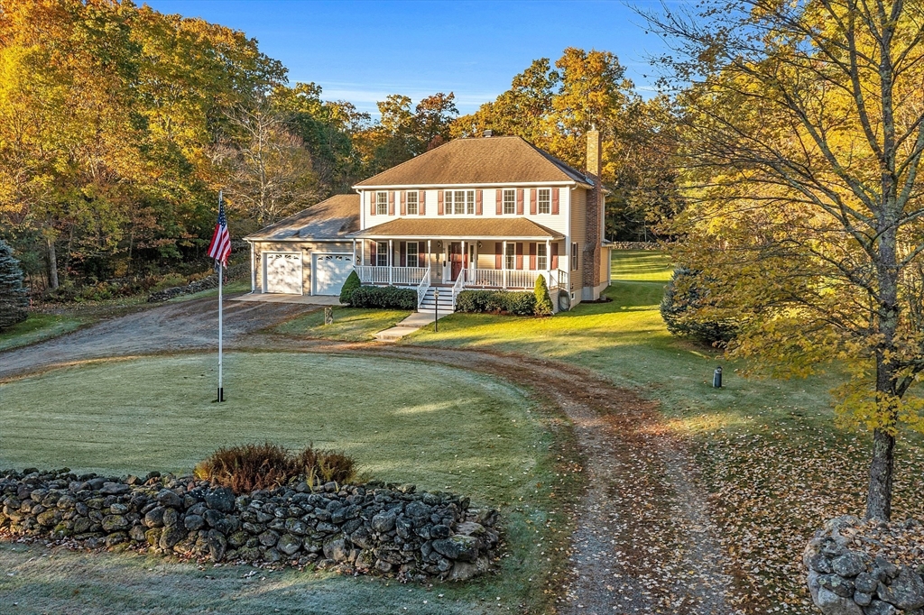 32 Simonds Hill Road Hubbardston, MA 01452 - Photo 2 of 42 a view of a house with a yard