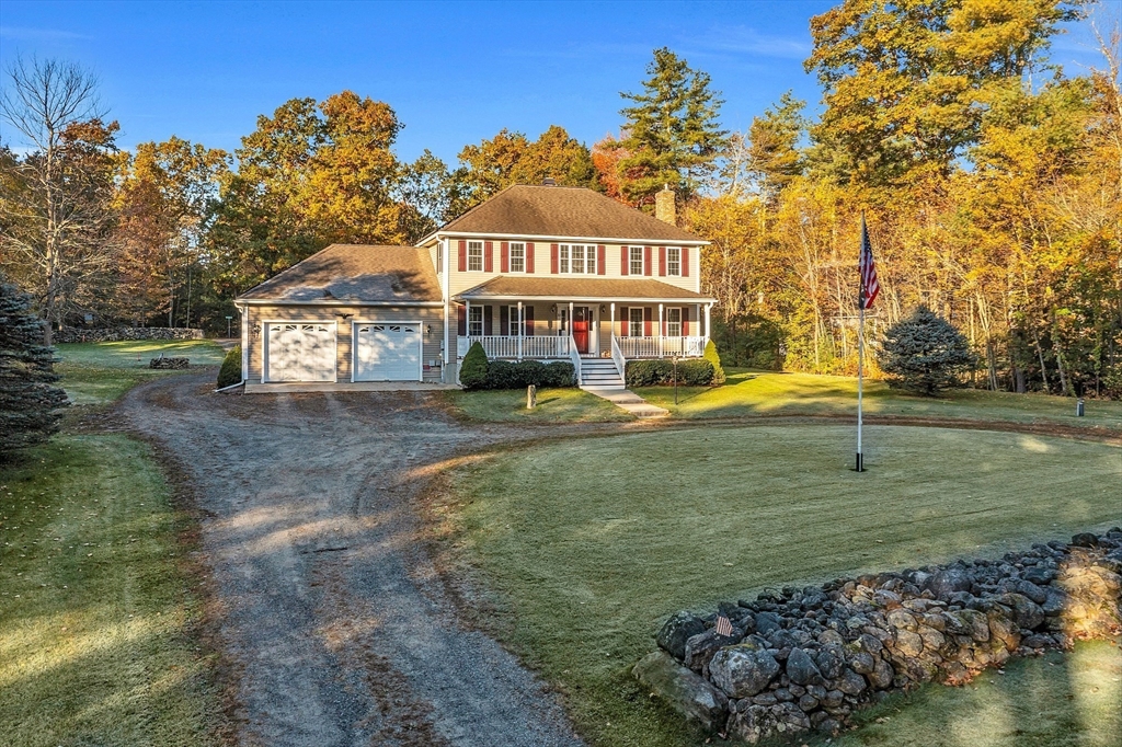 32 Simonds Hill Road Hubbardston, MA 01452 - Photo 3 of 42 a front view of a house with a yard