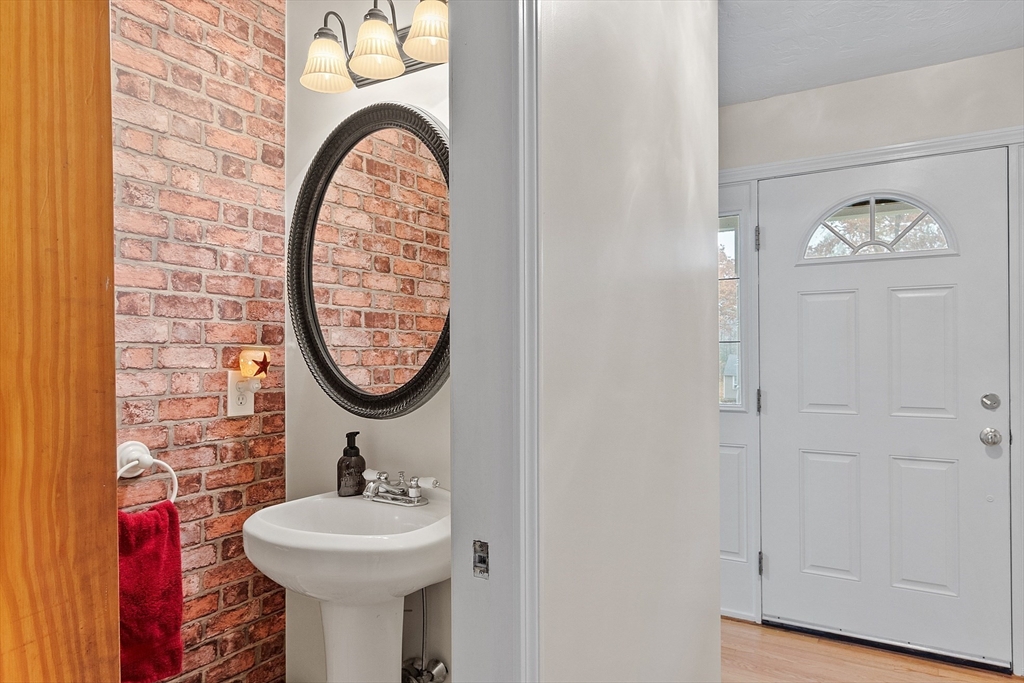32 Simonds Hill Road Hubbardston, MA 01452 - Photo 6 of 42 a bathroom with a sink and a mirror