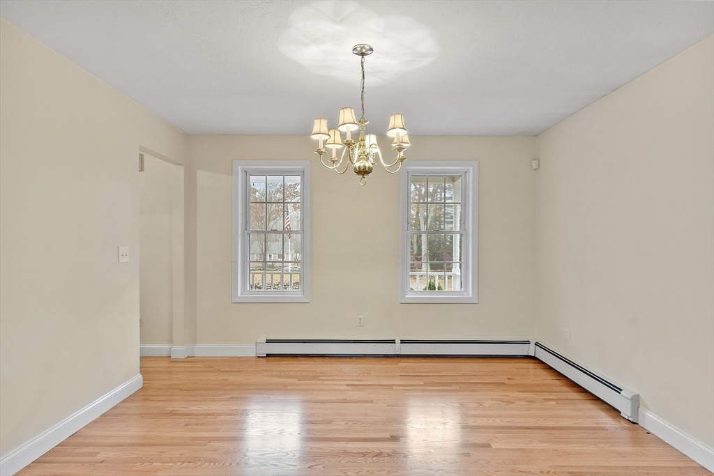 32 Simonds Hill Road Hubbardston, MA 01452 - Photo 7 of 42 a view of a room with wooden floor and window