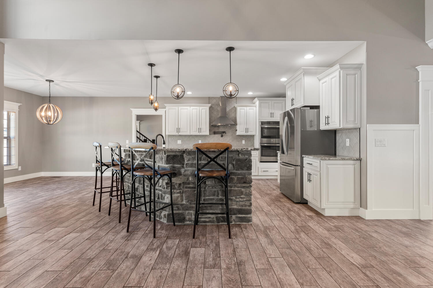 1101 Cascade Drive Savoy, IL 61874 - Photo 14 of 55 a view of a dining room with furniture and wooden floor
