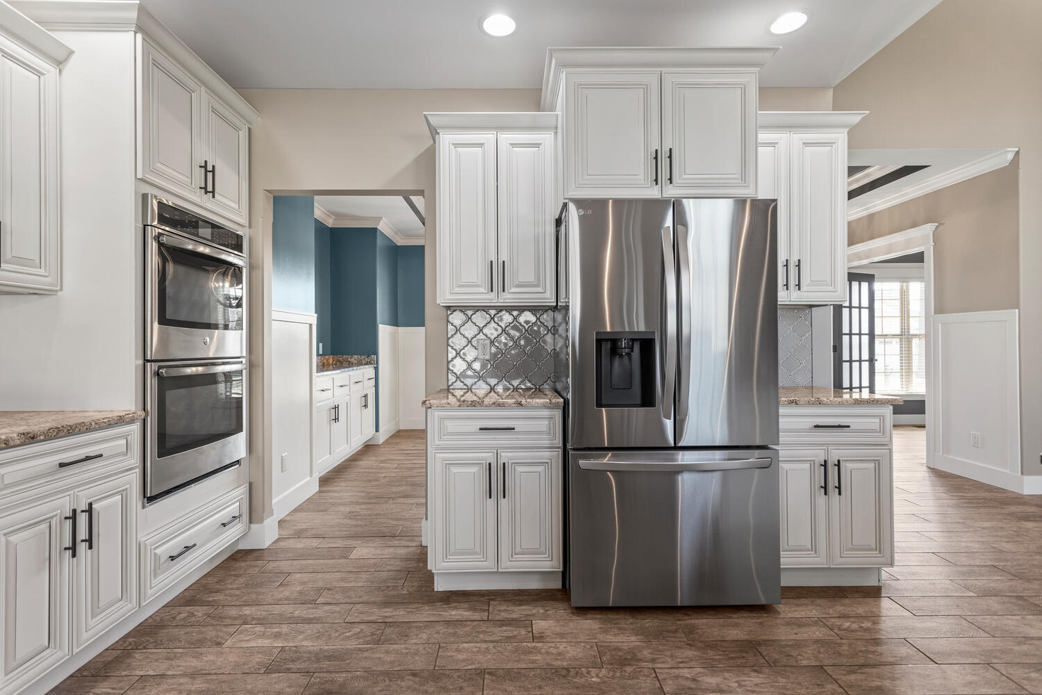 1101 Cascade Drive Savoy, IL 61874 - Photo 17 of 55 a kitchen with stainless steel appliances a refrigerator and a stove top oven