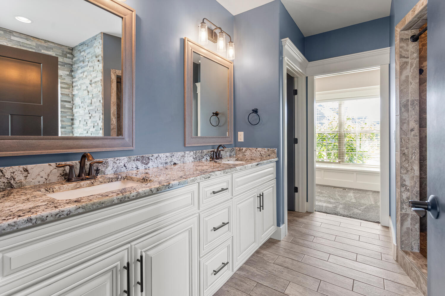 1101 Cascade Drive Savoy, IL 61874 - Photo 22 of 55 a bathroom with double sink and a mirror