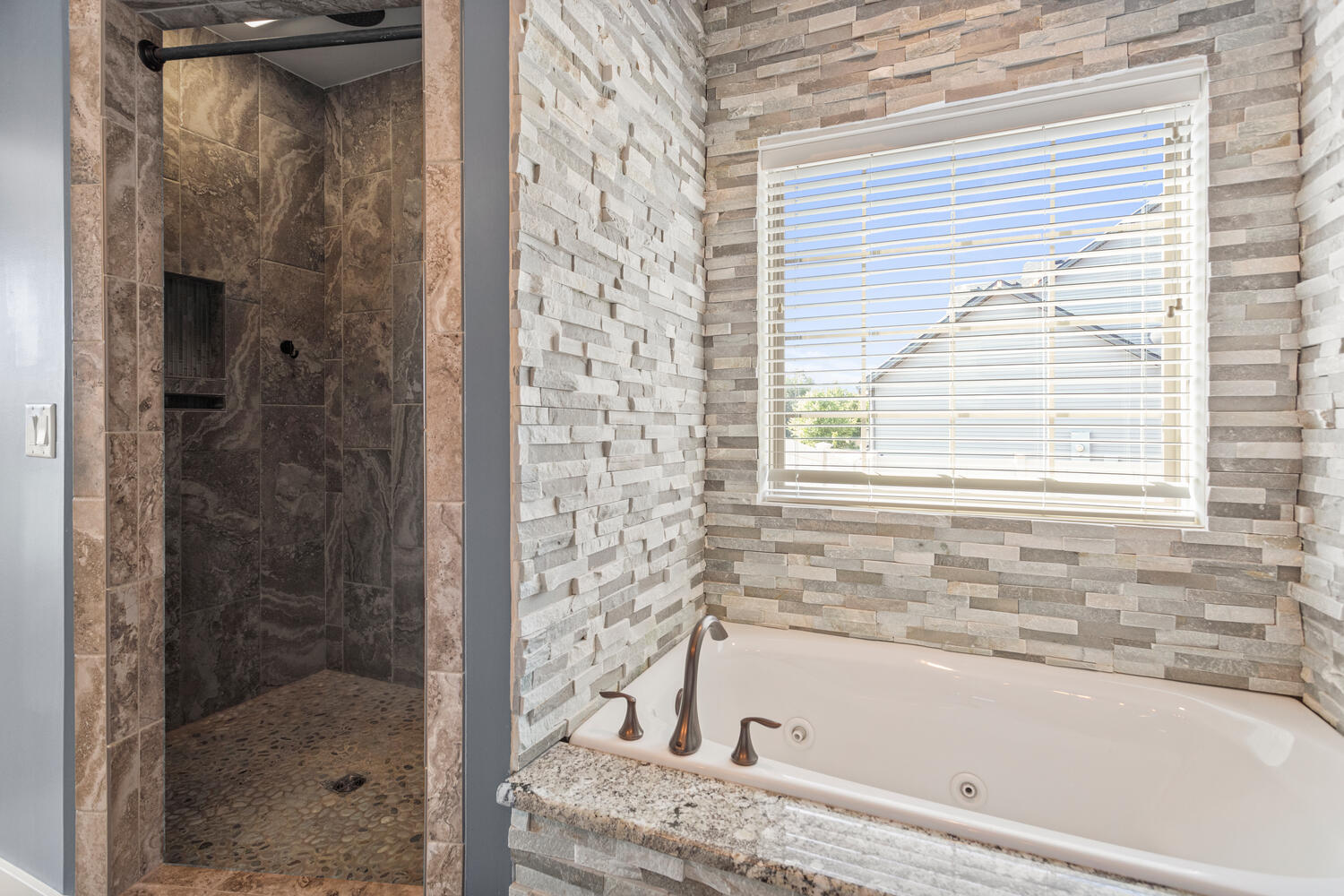1101 Cascade Drive Savoy, IL 61874 - Photo 23 of 55 a bathroom with a bathtub and shower