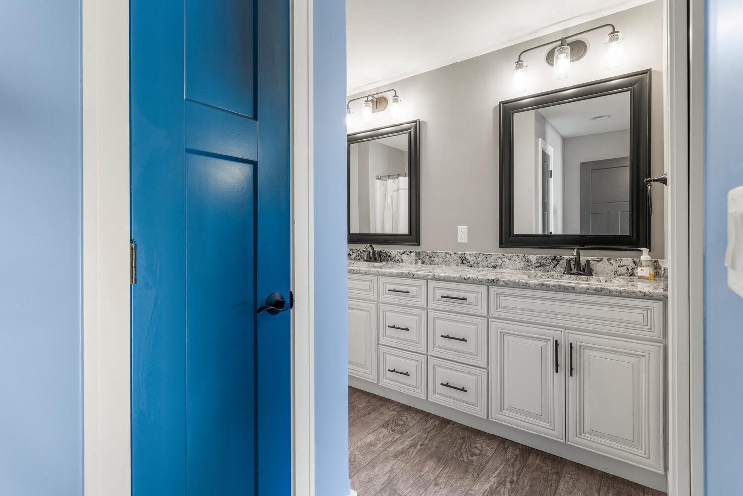 1101 Cascade Drive Savoy, IL 61874 - Photo 33 of 55 a bathroom with double vanity sink and a mirror