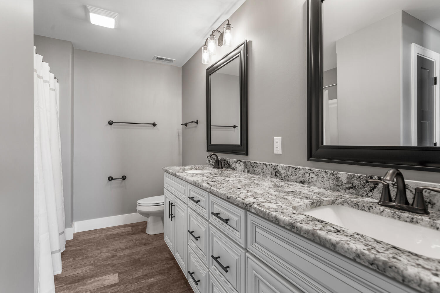 1101 Cascade Drive Savoy, IL 61874 - Photo 34 of 55 a bathroom with a granite countertop sink and a mirror