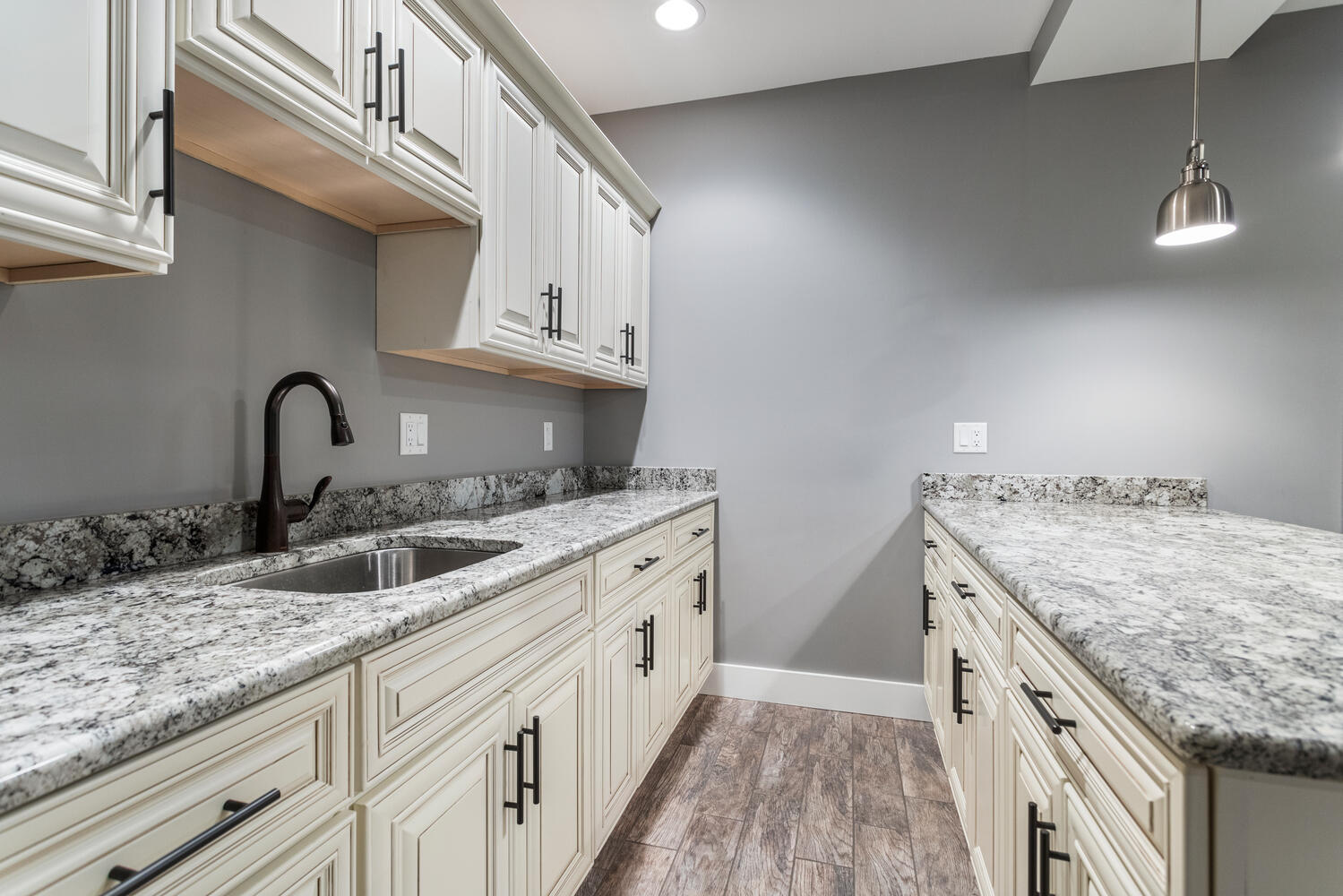 1101 Cascade Drive Savoy, IL 61874 - Photo 39 of 55 a kitchen with stainless steel appliances granite countertop a sink stove and cabinets