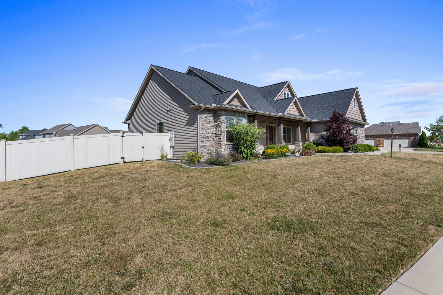 1101 Cascade Drive Savoy, IL 61874 - Photo 4 of 55 a view of a house next to a yard