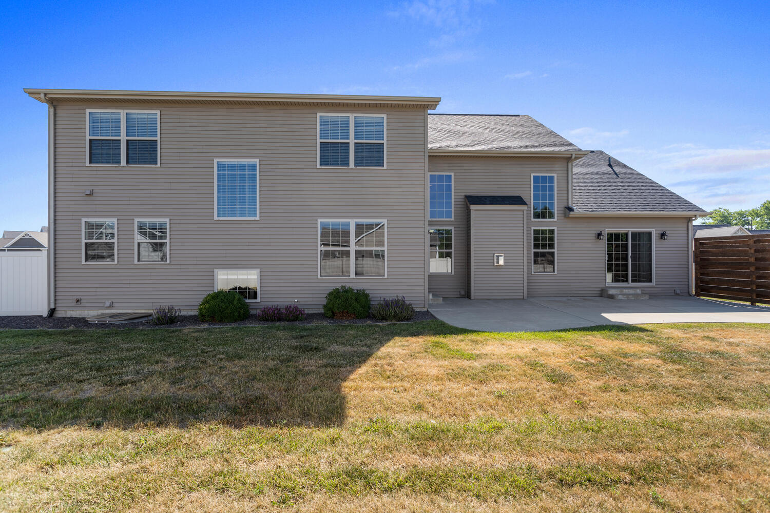 1101 Cascade Drive Savoy, IL 61874 - Photo 49 of 55 a house that has a big yard with large trees