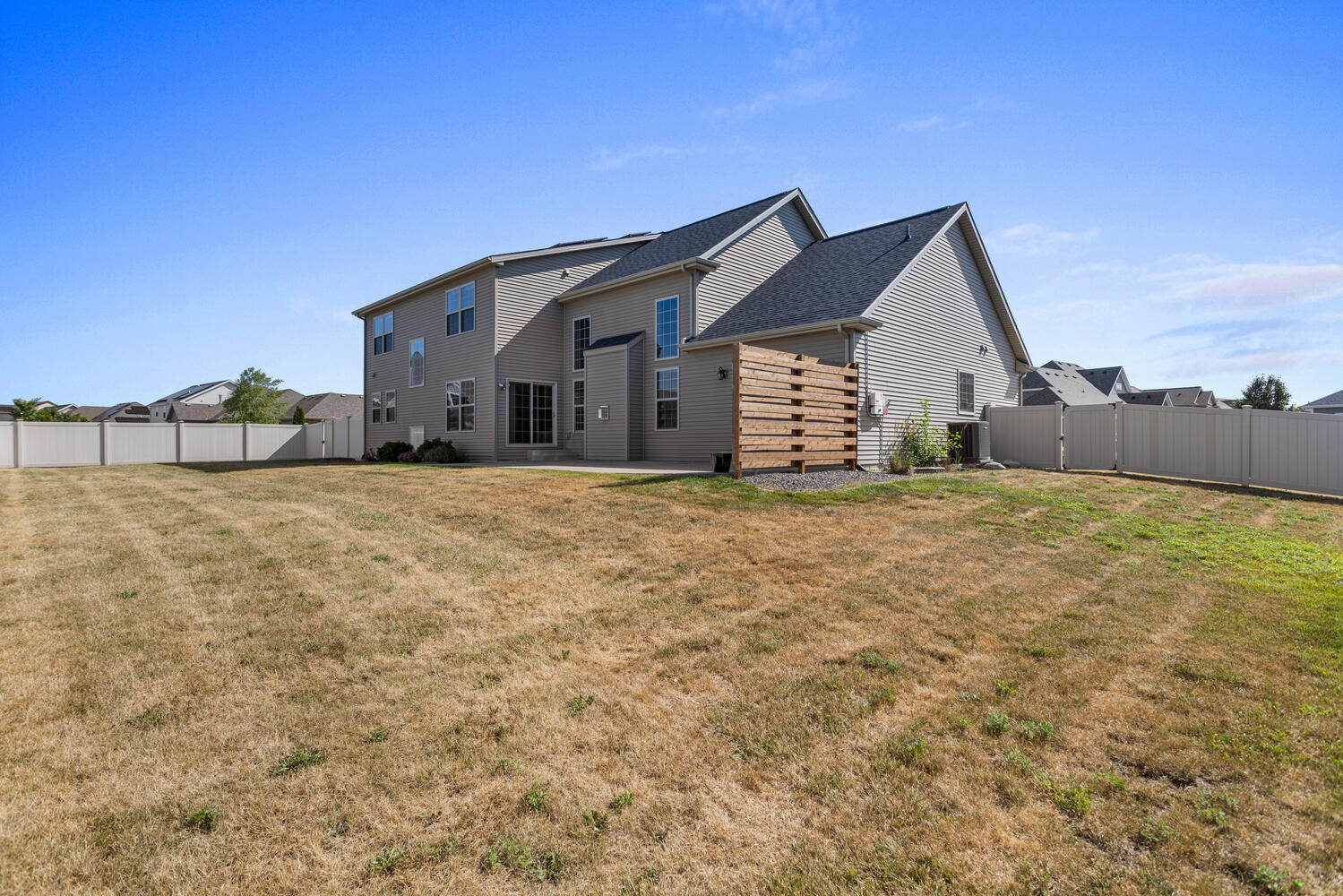 1101 Cascade Drive Savoy, IL 61874 - Photo 50 of 55 a big house with a big yard and large trees