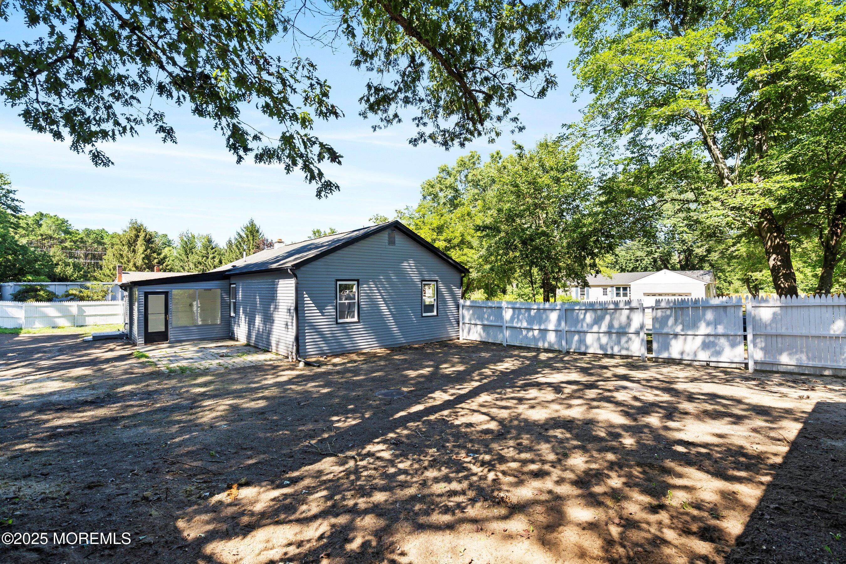 11 Malsbury Lane Cream Ridge, NJ 08514 - Photo 16 of 17 a front view of a house with a yard