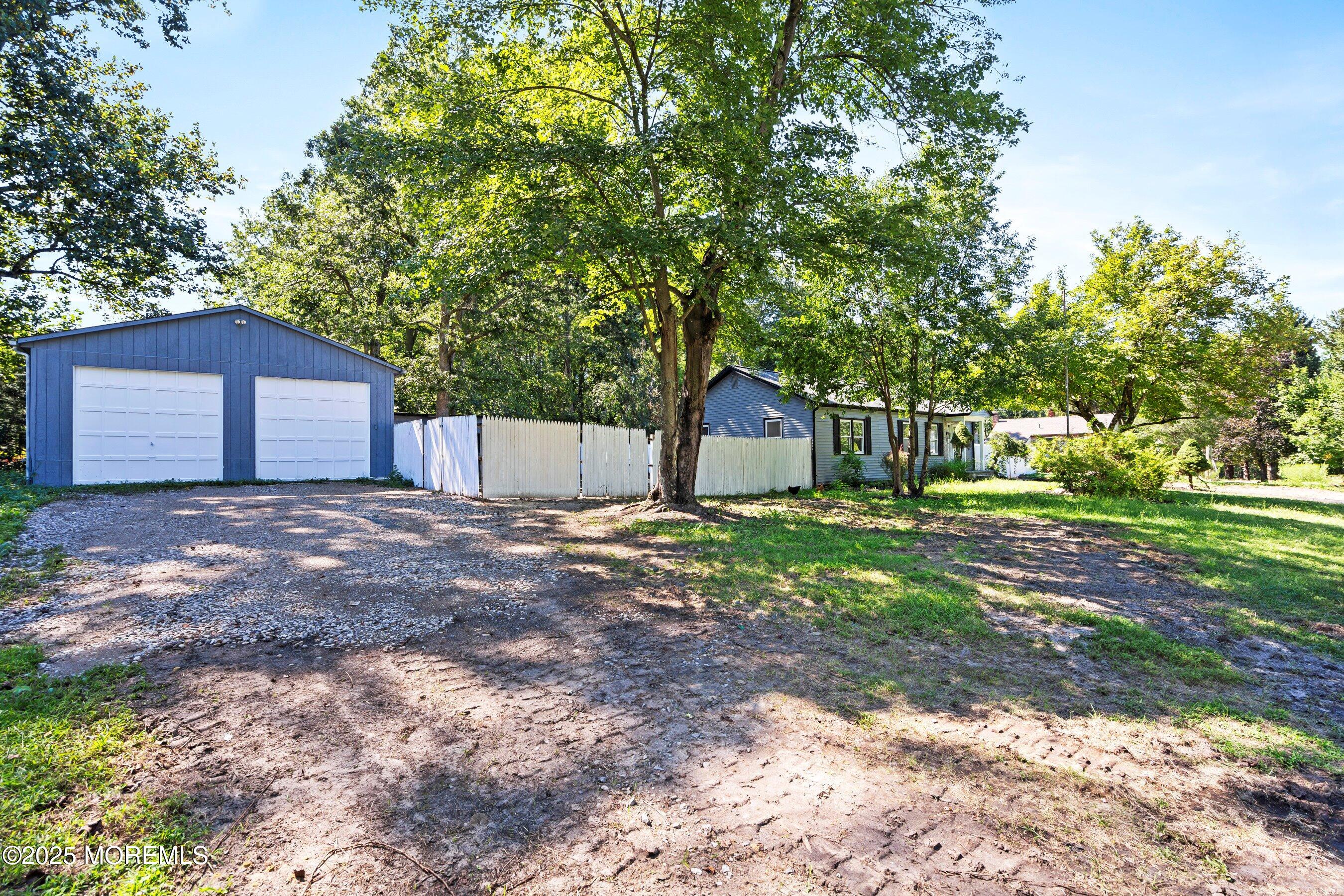 11 Malsbury Lane Cream Ridge, NJ 08514 - Photo 2 of 17 a view of a house with yard and a tree