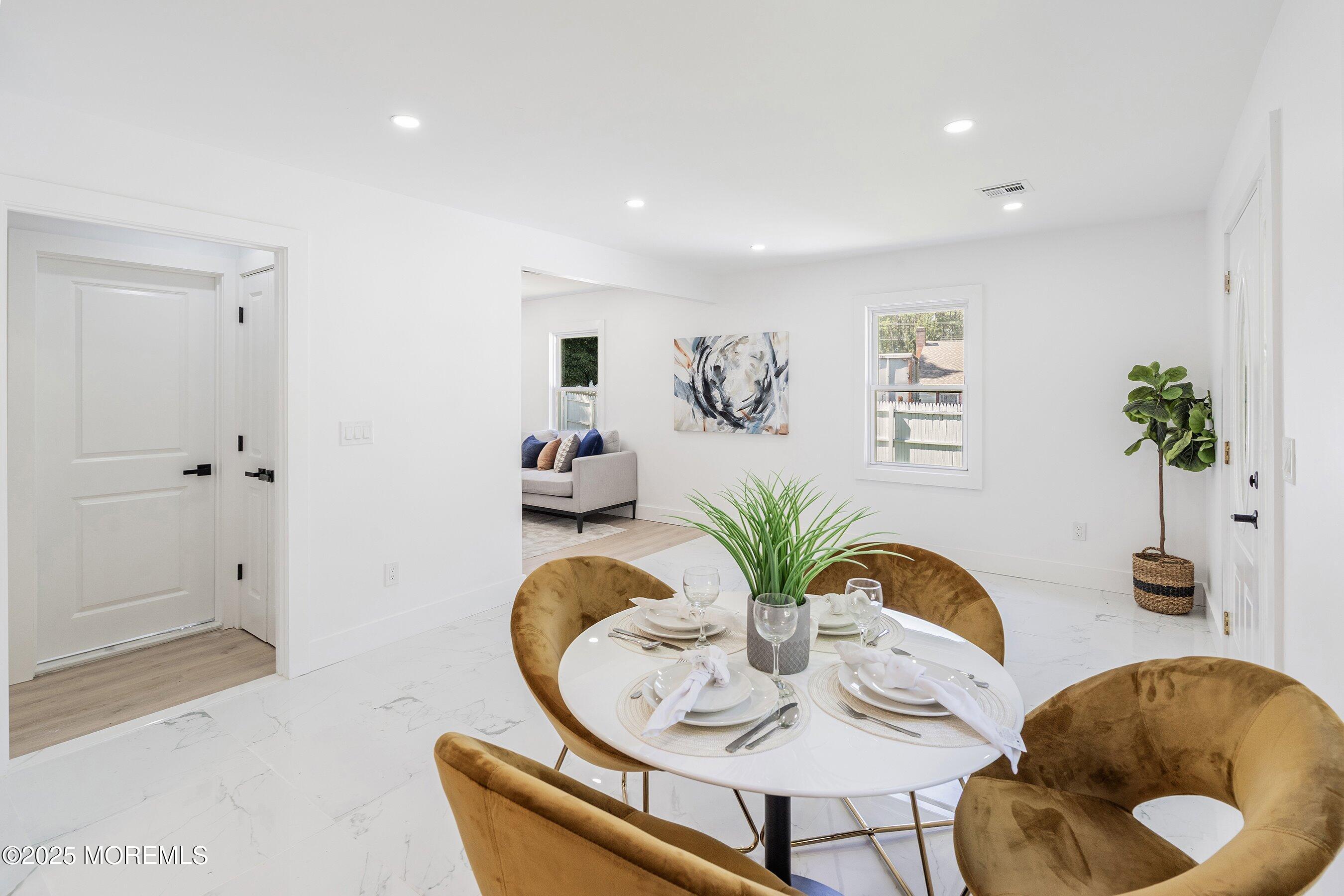 11 Malsbury Lane Cream Ridge, NJ 08514 - Photo 6 of 17 a living room with furniture potted plant and mirror