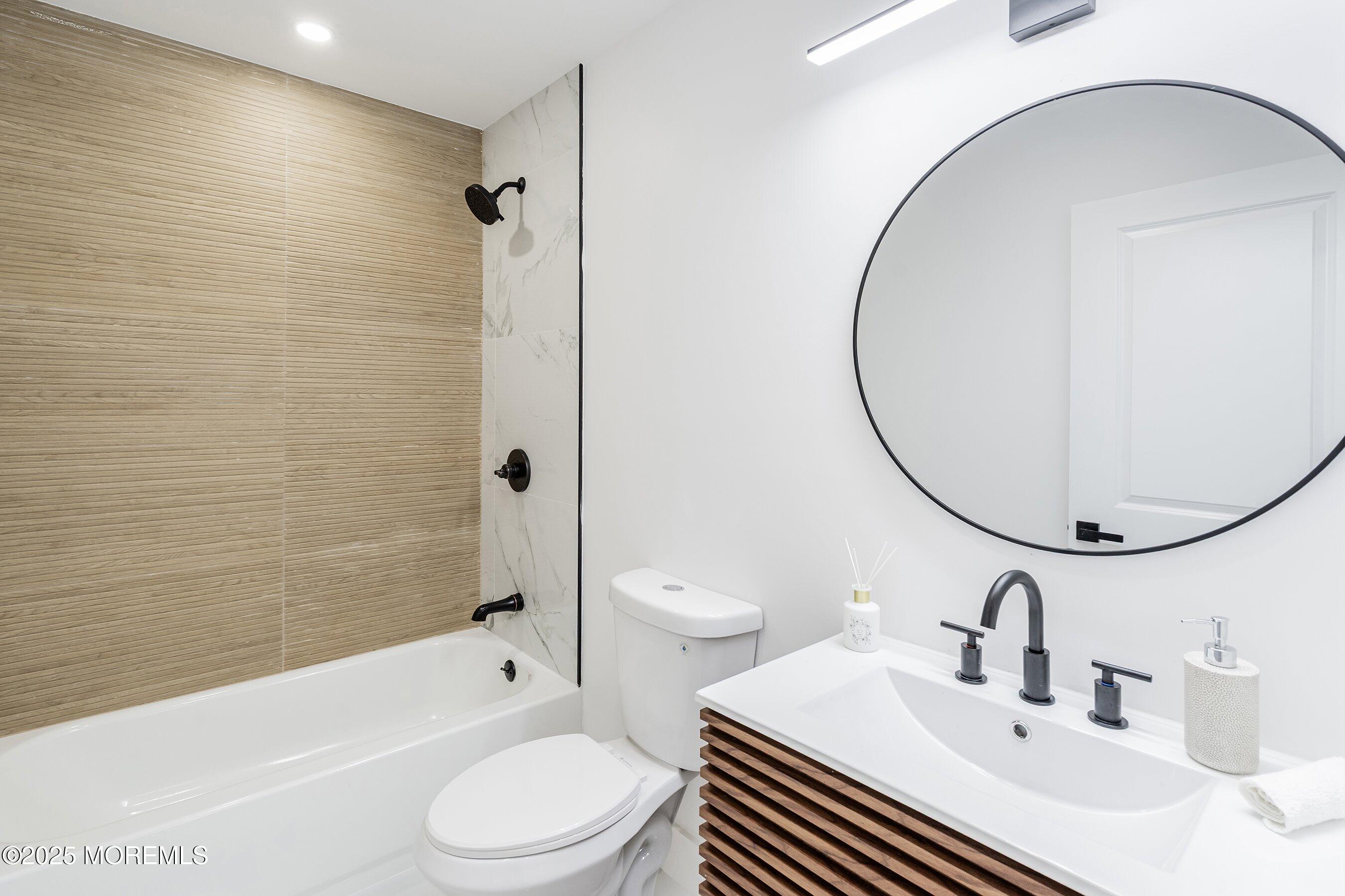 11 Malsbury Lane Cream Ridge, NJ 08514 - Photo 8 of 17 a bathroom with a sink toilet and shower
