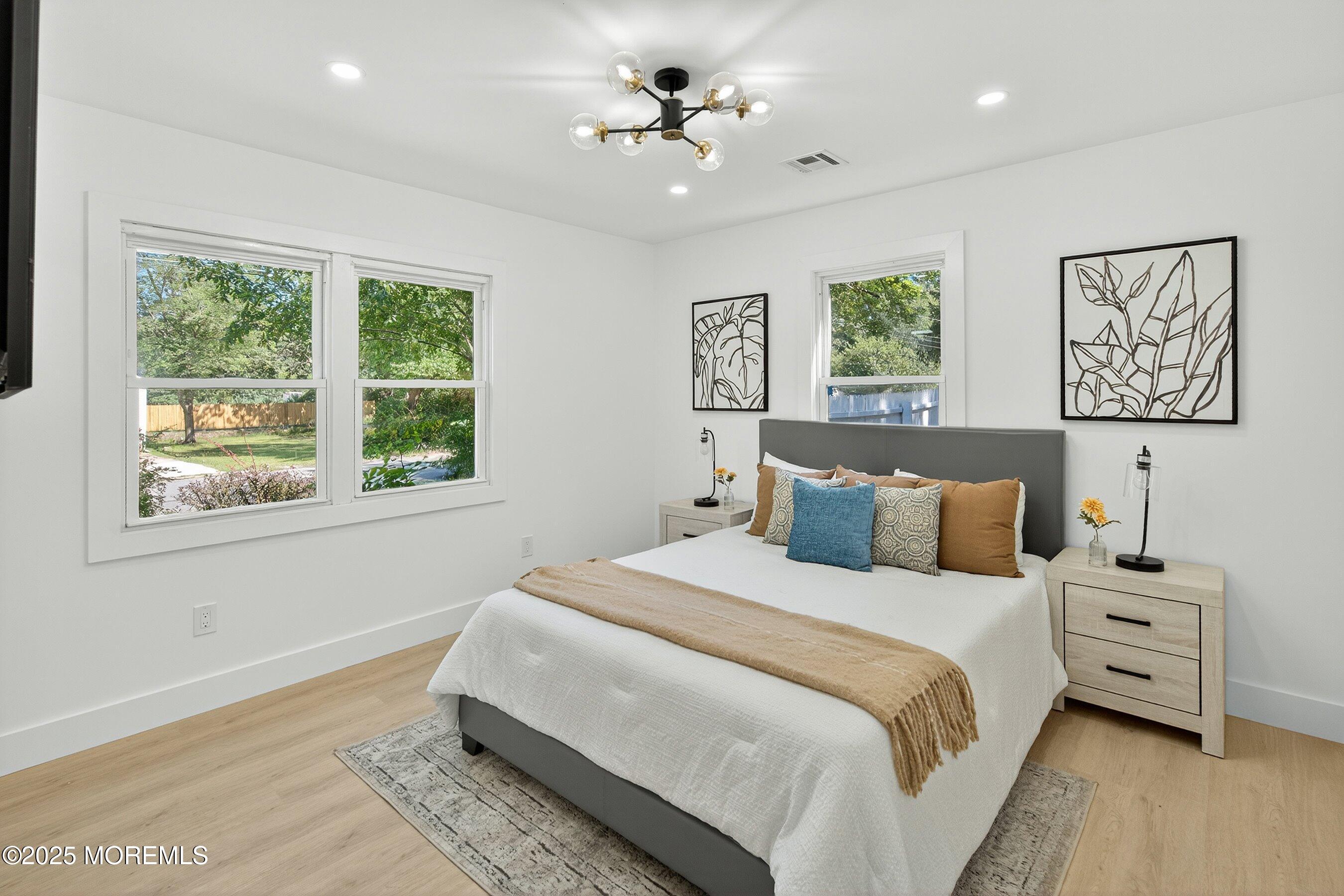 11 Malsbury Lane Cream Ridge, NJ 08514 - Photo 9 of 17 a bedroom with a bed and a window