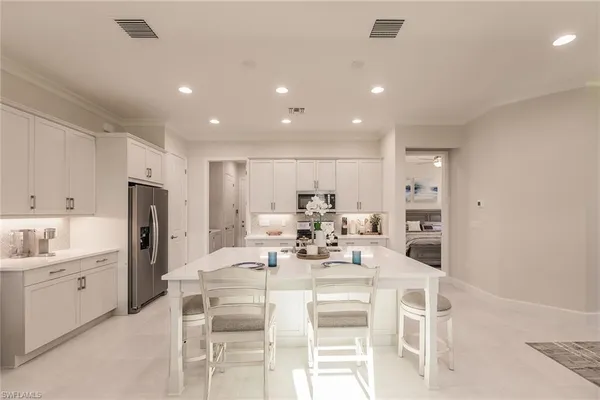 a view of a dining room kitchen and a sink